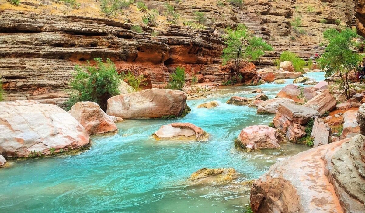 Turquoise Havasu Creek flowing through red rock walls on the Havasupai Reservation