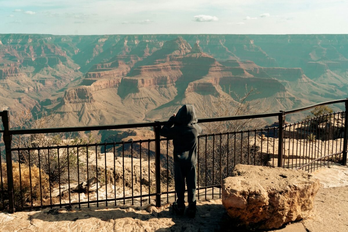 Child looking out across the Grand Canyon from the rim