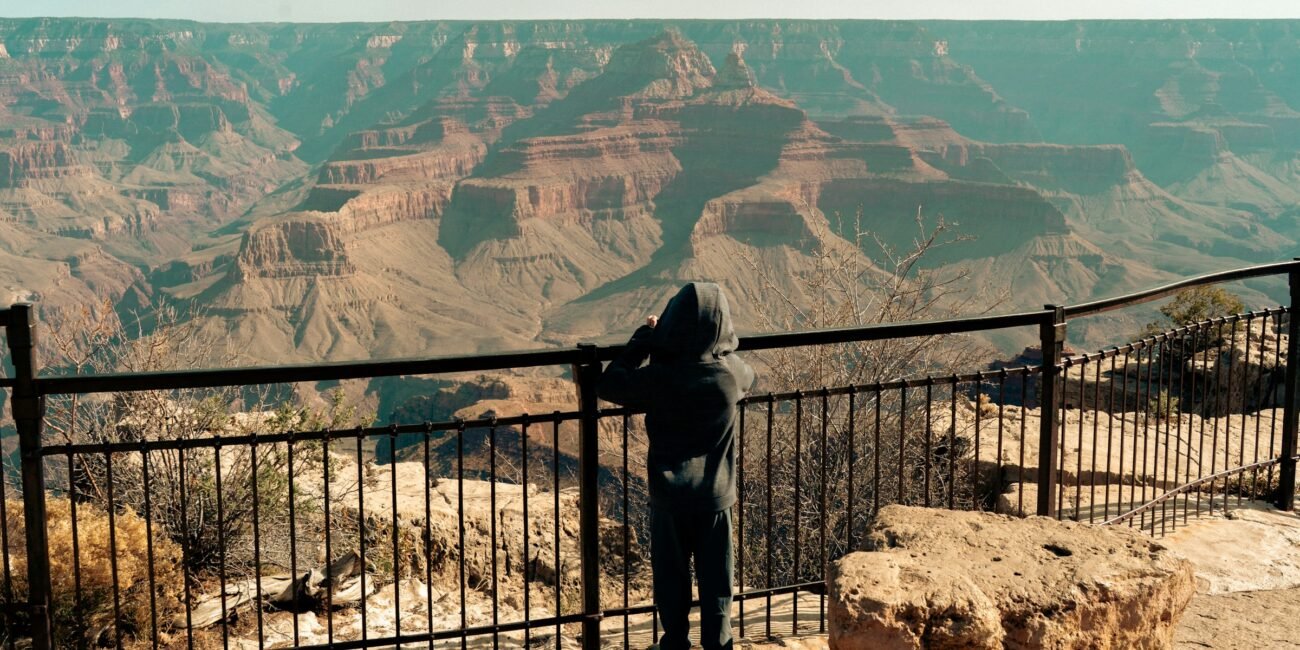 Child looking out across the Grand Canyon from the rim