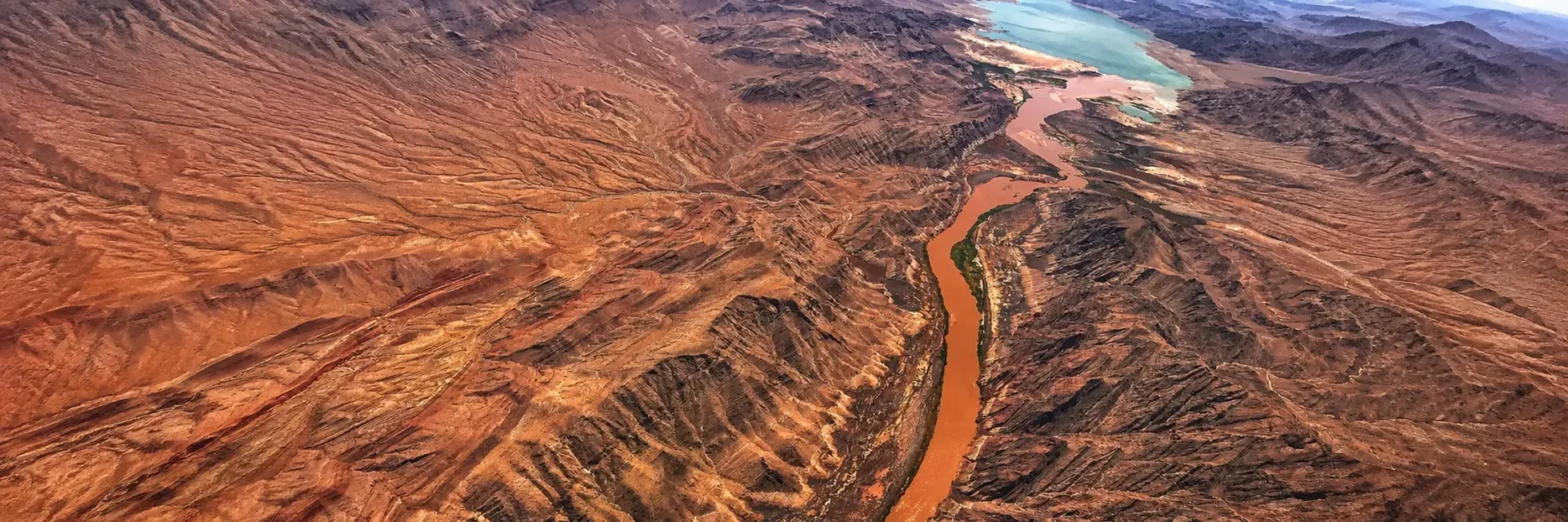 Aerial view of the Colorado River winding through the Grand Canyon