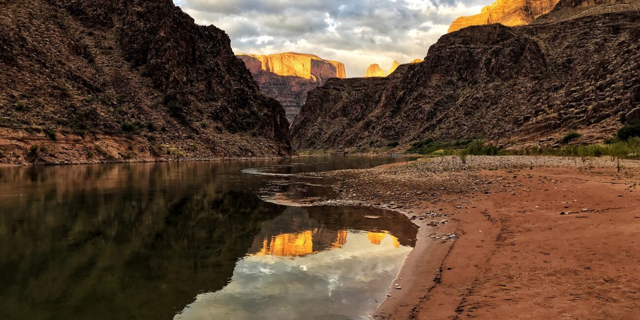 Colorado River beside a sandy beach in the Grand Canyon