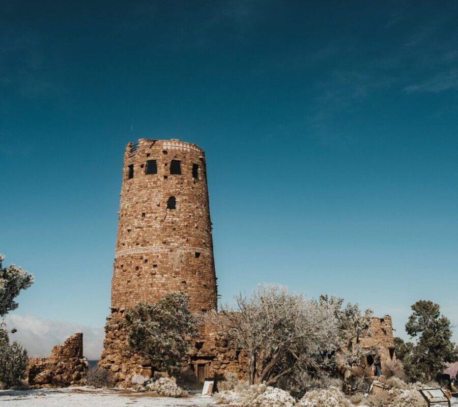 Desert View Watchtower above snow-covered ground at Grand Canyon National Park