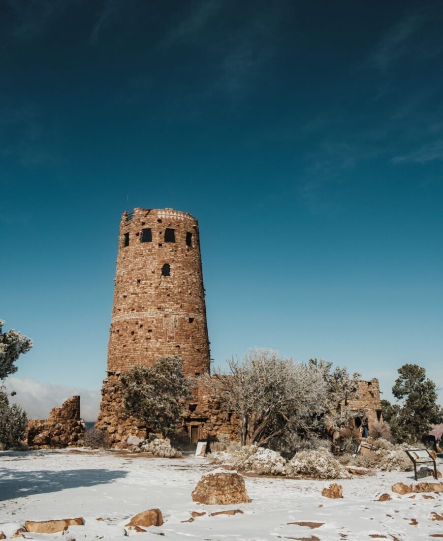 Desert View Watchtower above snow-covered ground at Grand Canyon National Park