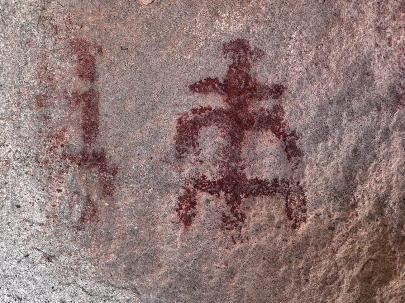 Red ancestral pictograph painted on Grand Canyon rock