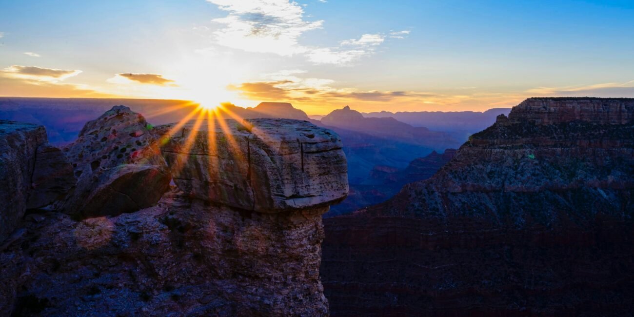 Sunrise over layered cliffs at the Grand Canyon South Rim