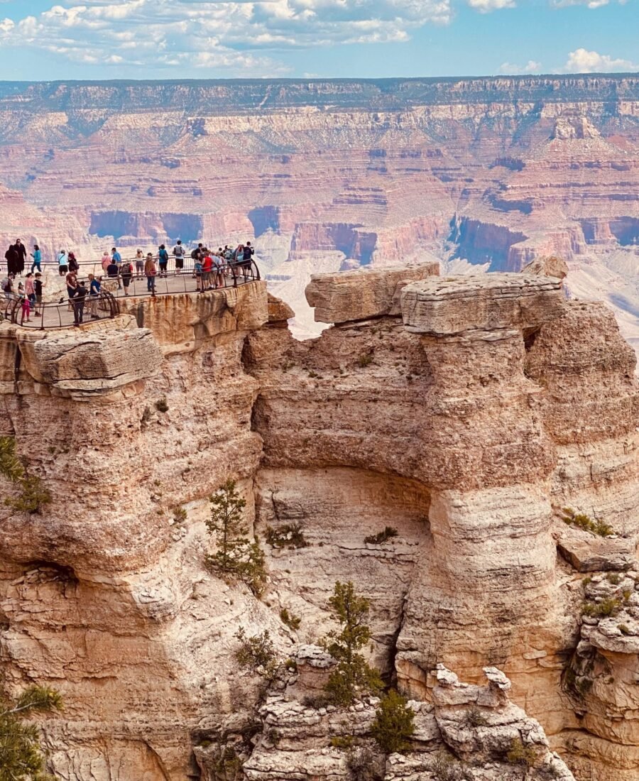 Visitors overlooking the Grand Canyon from Mather Point on the South Rim