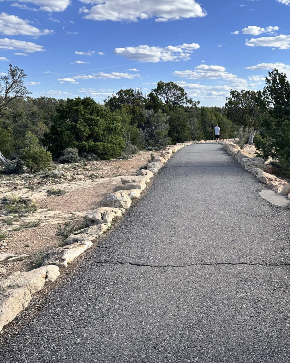 Paved Trail of Time winding along the Grand Canyon South Rim