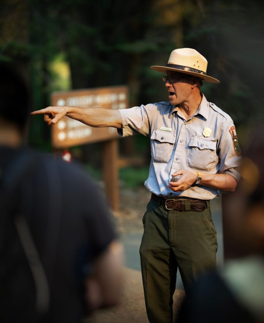 National Park Service ranger speaking to visitors during an outdoor interpretive program