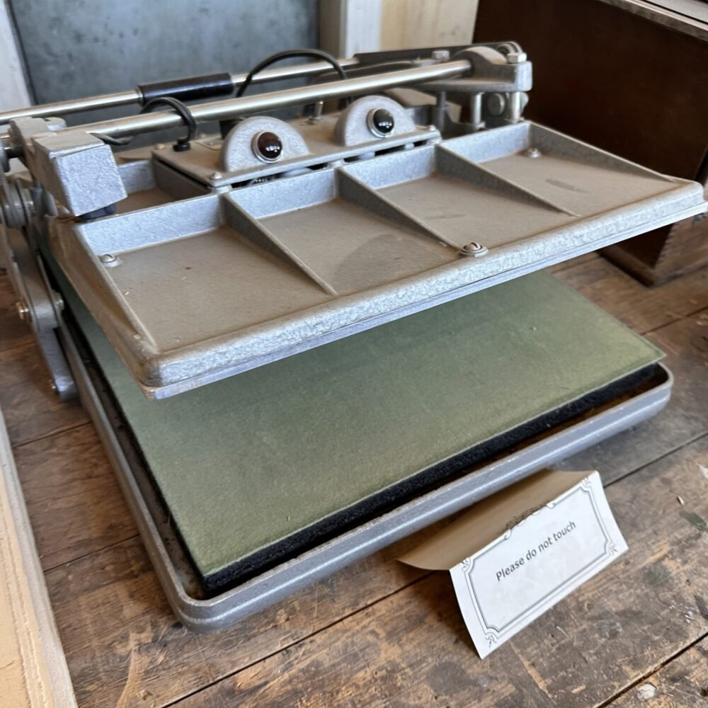 Historic camera and photographic equipment displayed inside Kolb Studio at the Grand Canyon