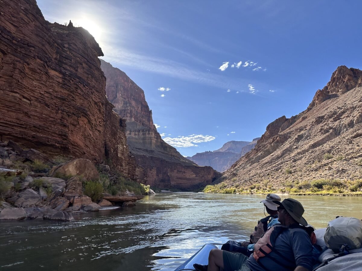 Raft passengers traveling through the Grand Canyon