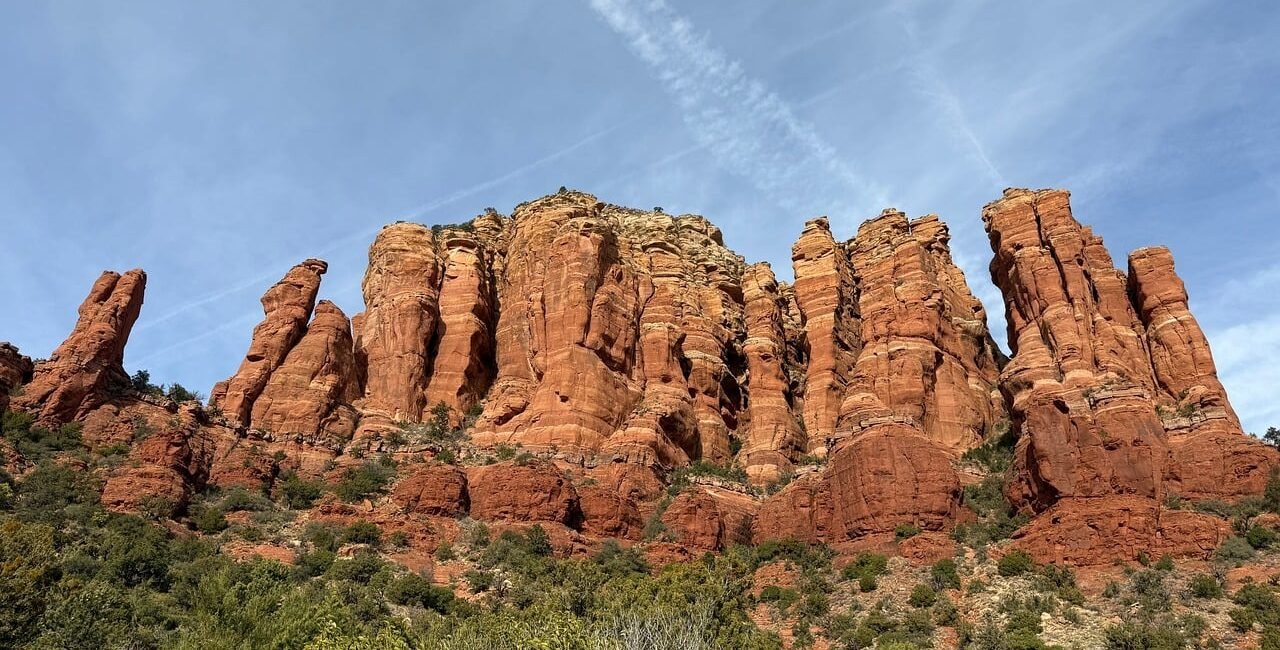 Red sandstone formations and desert vegetation in Sedona, Arizona
